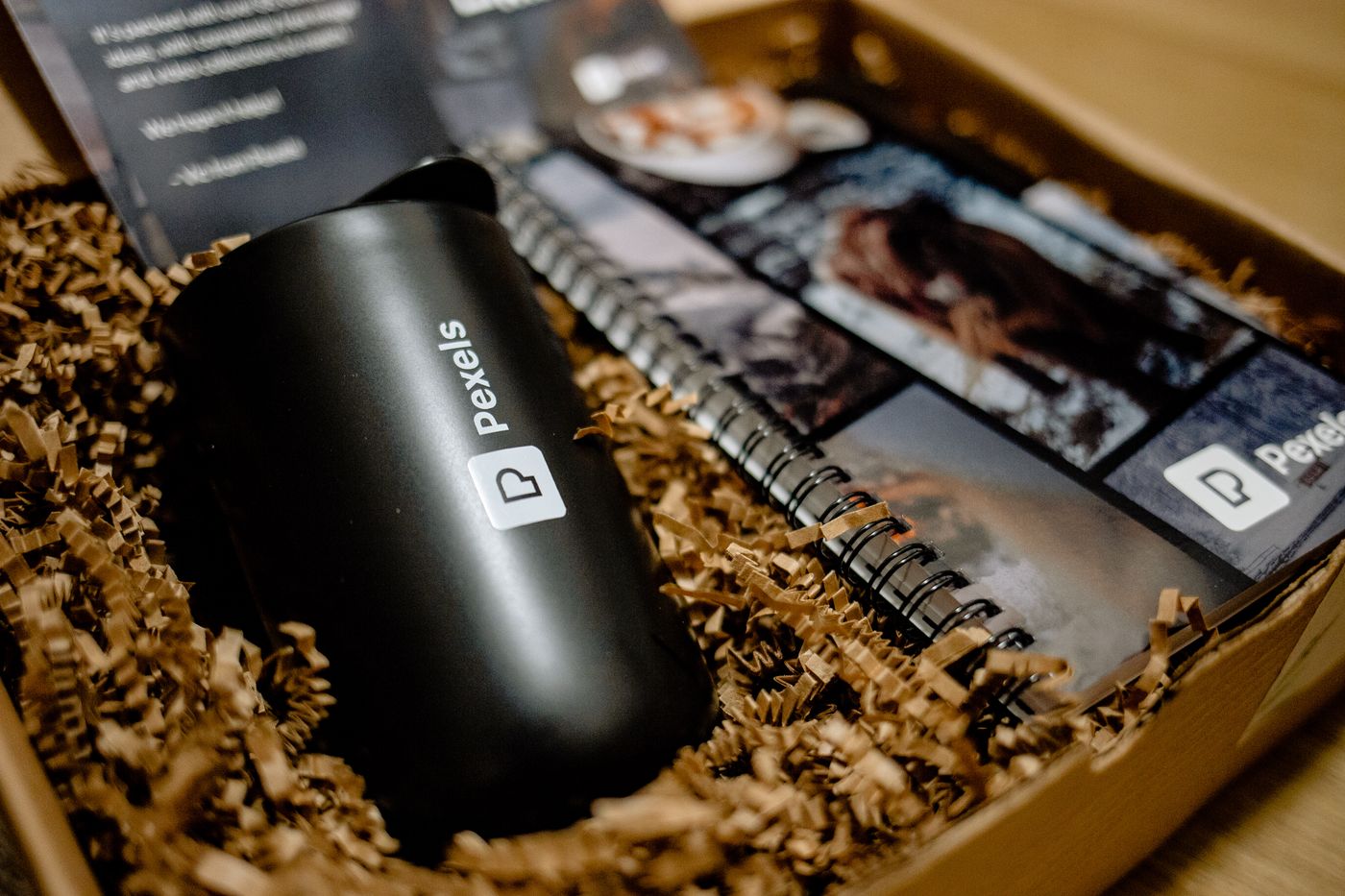 Curated gift set with a printed mug and notebook