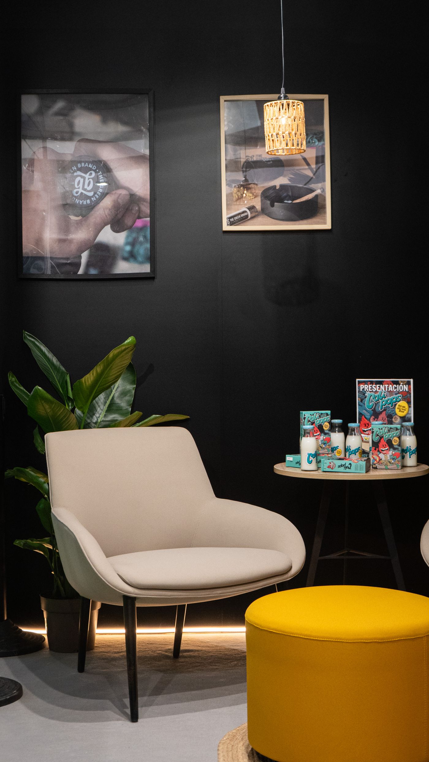 Branded exhibition booth with display graphics and furnishings